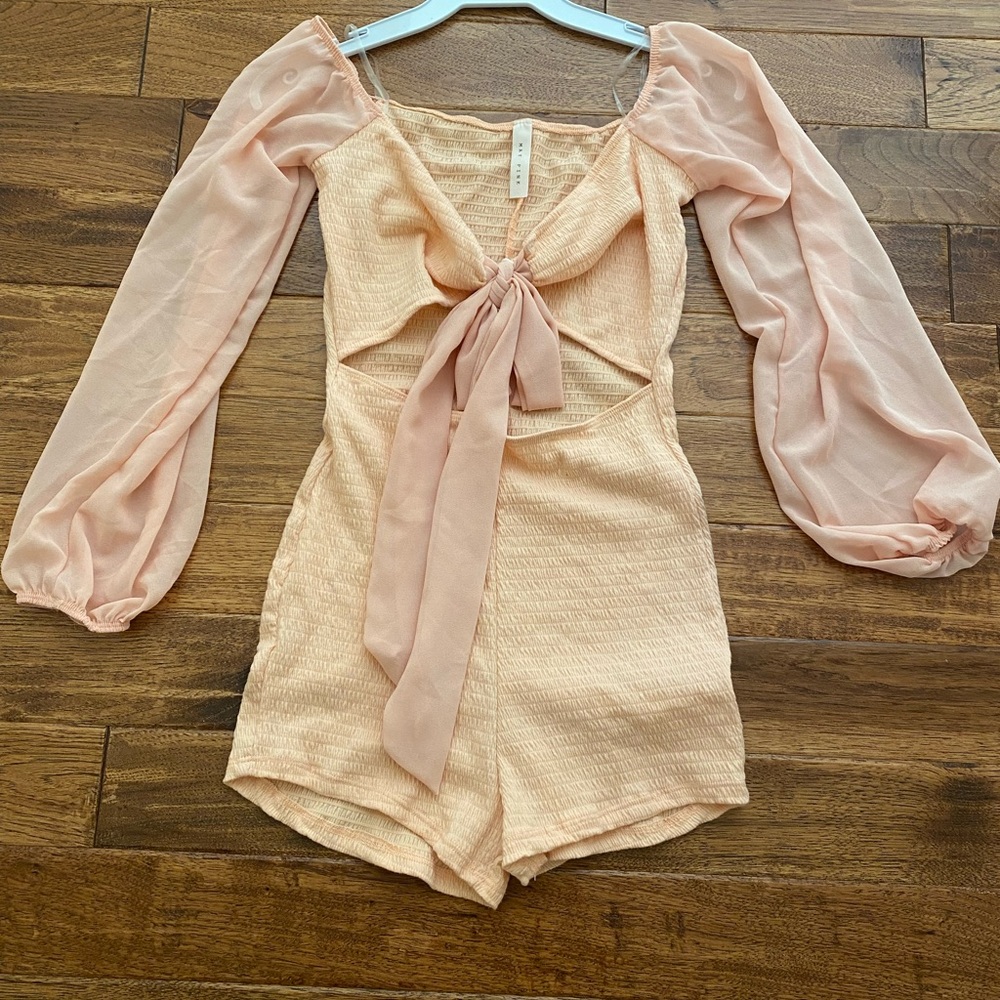 Chic Peach Romper with Sheer Sleeves